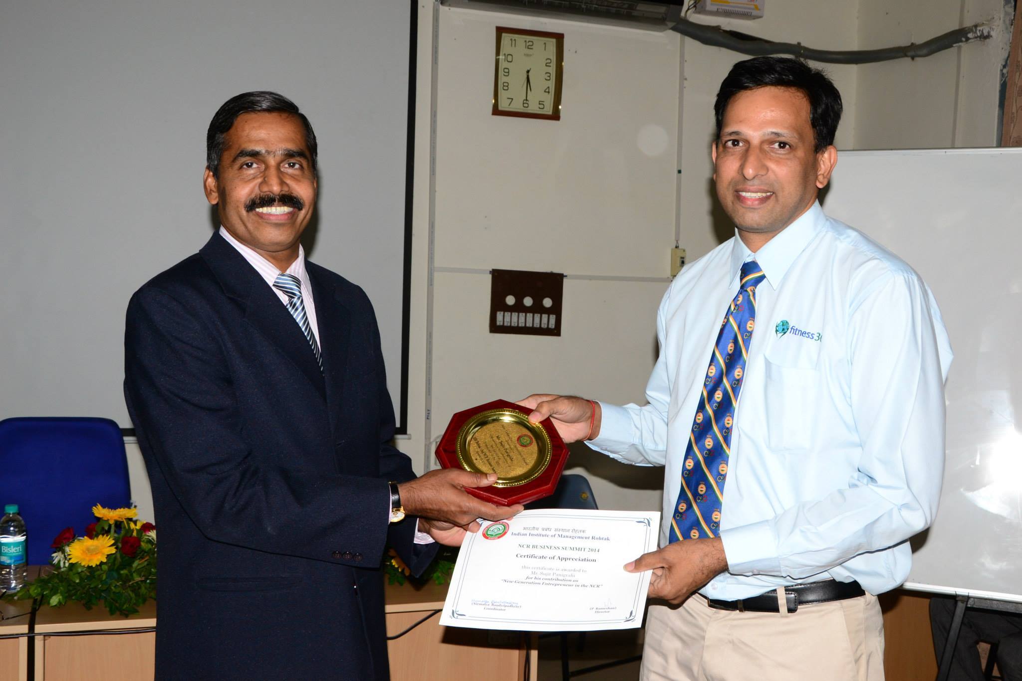Mr. Sujit Panigrahi receiving "New Generation Entrepreneur" award from Mr. P Rameshan, Director, IIM Rohtak